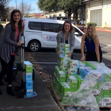 CareBOX team loading Organic Nutritional Supplements