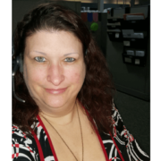 Woman in red and black shirt